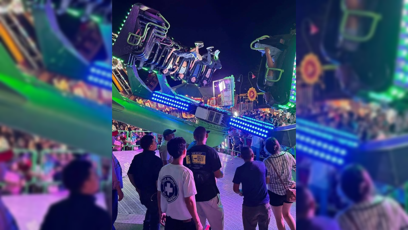 Varias personas quedaron suspendidas boca abajo tras un desperfecto en el campo de la feria de Acajutla, en Sonsonate Oeste. Cuerpos de socorro atendieron la emergencia en las diversiones. Foto: Cortesía.