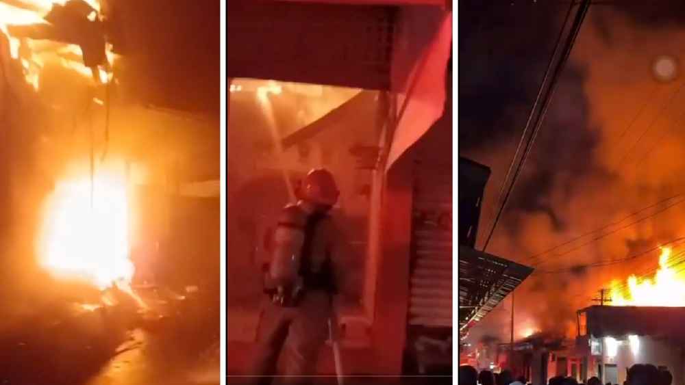 Equipos de Bomberos trabajan en el control del fuego dentro del mercado municipal de Armenia.